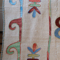 Chain stitch detail - Vintage Uzbek Suzani kilim rug with embroidered floral medallions and vine scroll border, 173 x 230cm