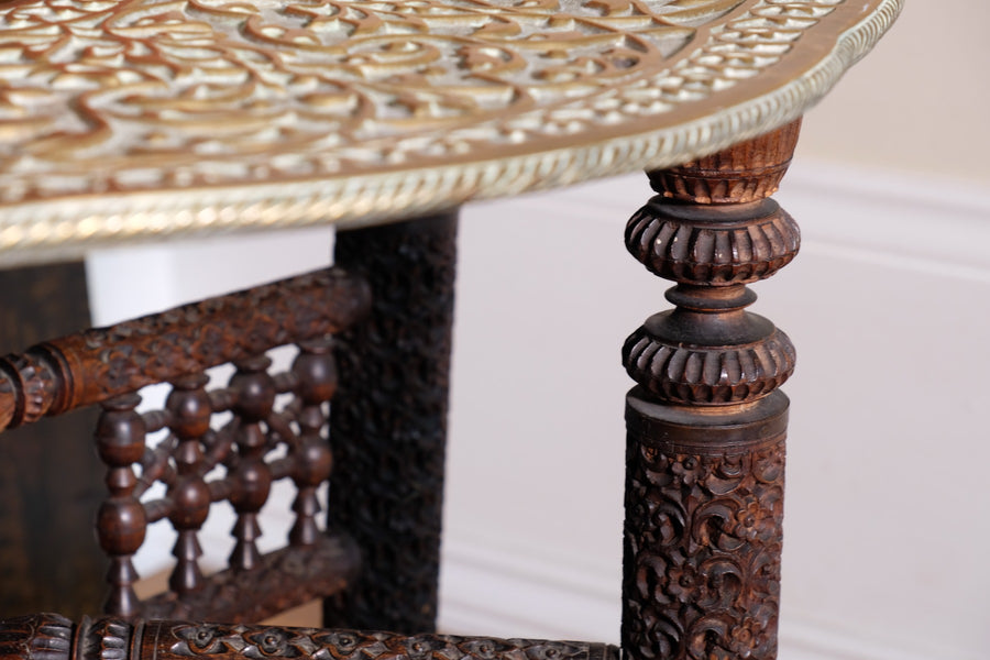 Anglo Indian Intricately Carved Table With A Decorative Brass Top