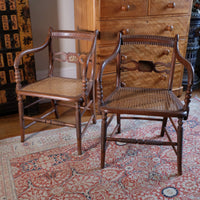 Pair of Regency mahogany armchairs with brass inlay and cane seats, circa 1810