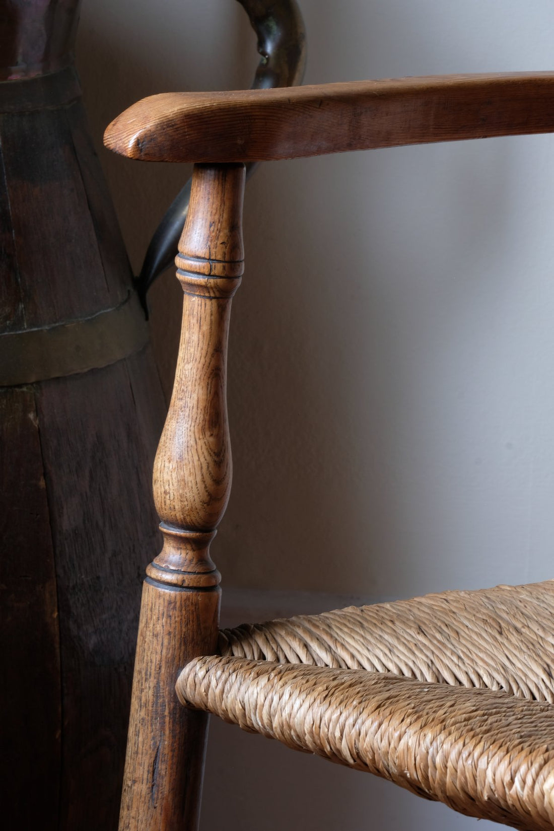 Close up turned arm supports on the Philip Clissett Arts & Crafts Ash Rush Seat Spindle Back Armchair Circa 1890Philip Clissett Arts & Crafts Ash Rush Seat Spindle Back Armchair Circa 1890