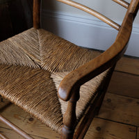 Seat and arm view of a Philip Clissett Arts & Crafts Ash Rush Seat Spindle Back Armchair Circa 1890Philip Clissett Arts & Crafts Ash Rush Seat Spindle Back Armchair Circa 1890