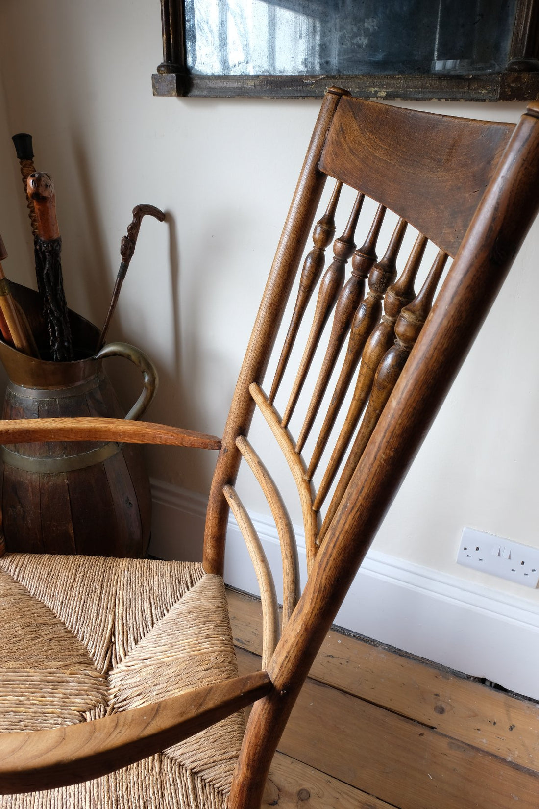View of a Curved shape cack of a Philip Clissett Arts & Crafts Ash Rush Seat Spindle Back Armchair Circa 1890