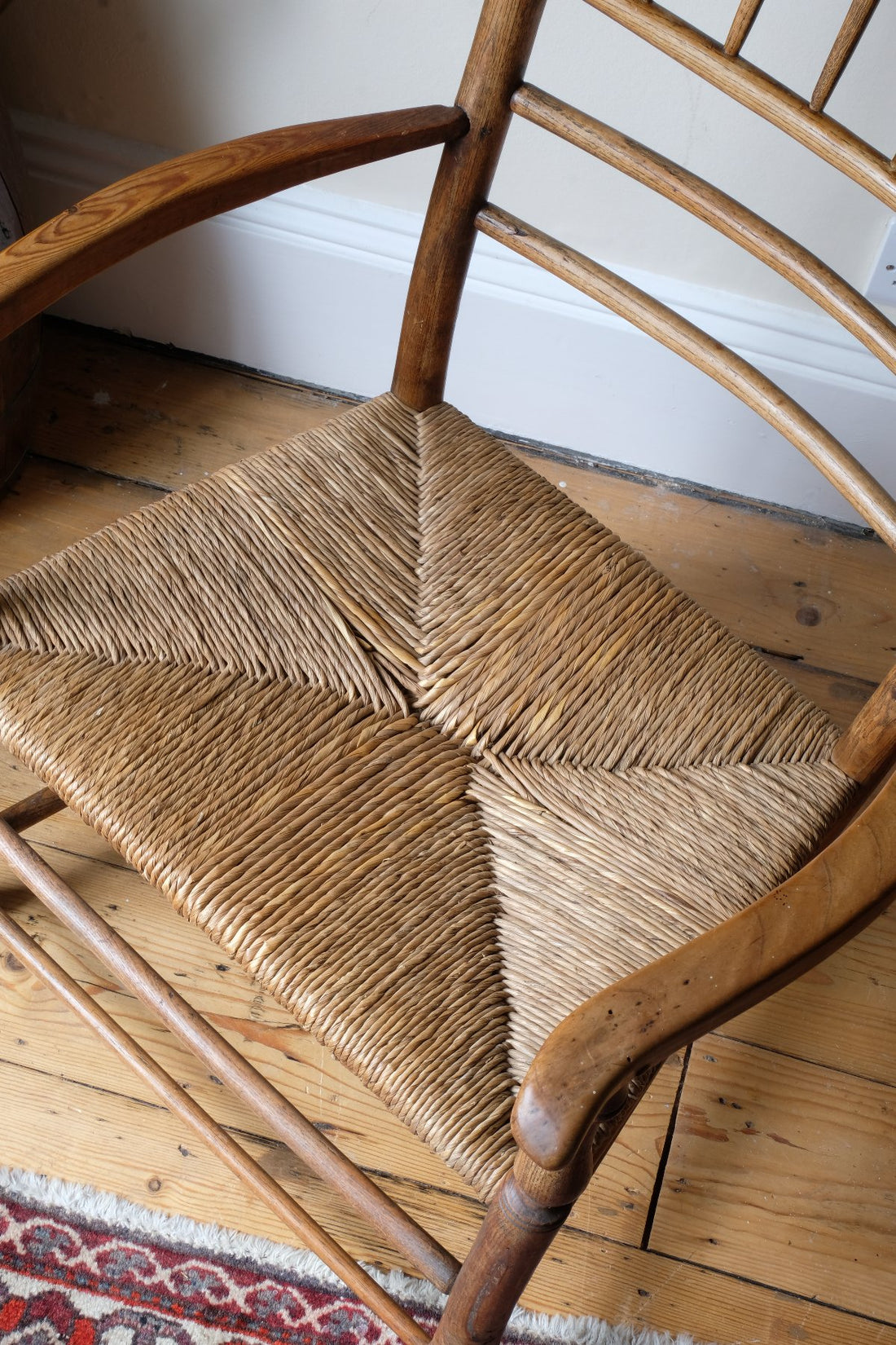 Rush seat of a Philip Clissett Arts & Crafts Ash Rush Seat Spindle Back Armchair Circa 1890