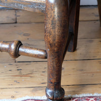 baluster-turned leg with a pad foot on a Antique Lancashire Oak Spindle Back Armchair with Rush Seat, 19th Century North Country Chair