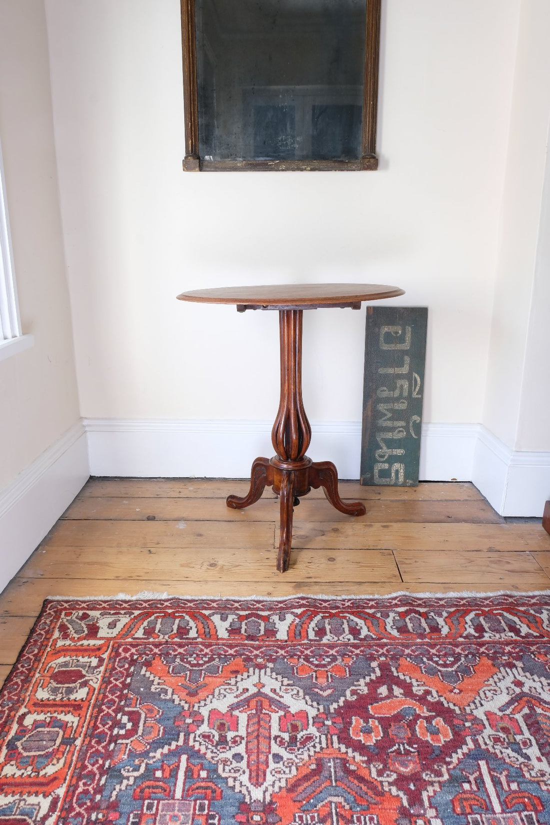 Late Victorian mahogany oval tilt-top tripod table with open reed column detail
