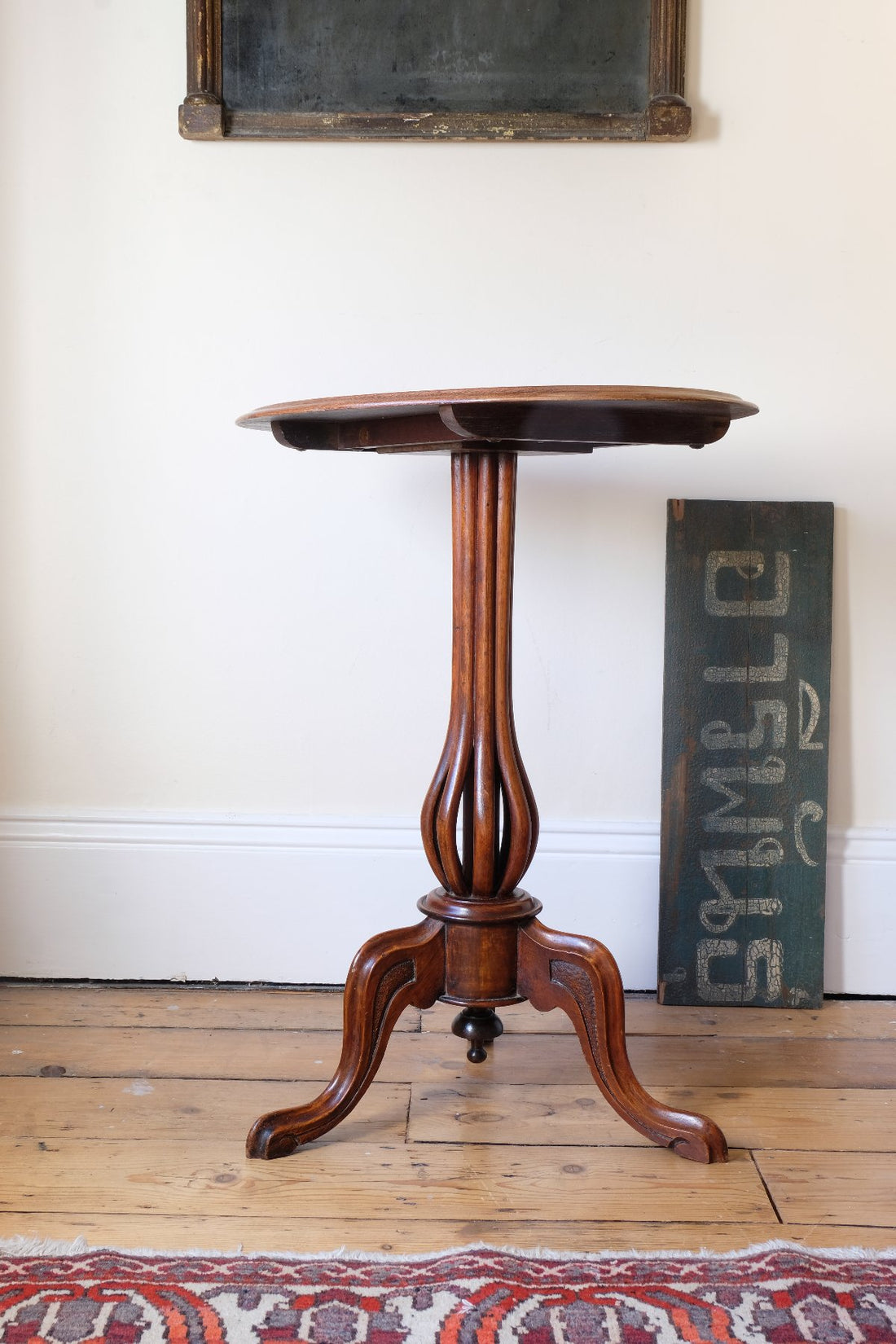 Late Victorian mahogany oval tilt-top tripod table with open reed column detail