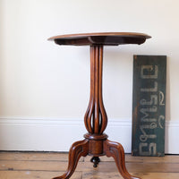 Late Victorian mahogany oval tilt-top tripod table with open reed column detail