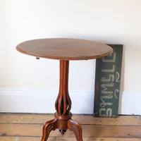 Late Victorian mahogany oval tilt-top tripod table with open reed column detail
