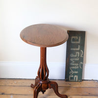 Late Victorian mahogany oval tilt-top tripod table with open reed column detail