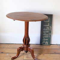 Late Victorian mahogany oval tilt-top tripod table with open reed column detail