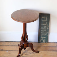 Late Victorian mahogany oval tilt-top tripod table with open reed column detail