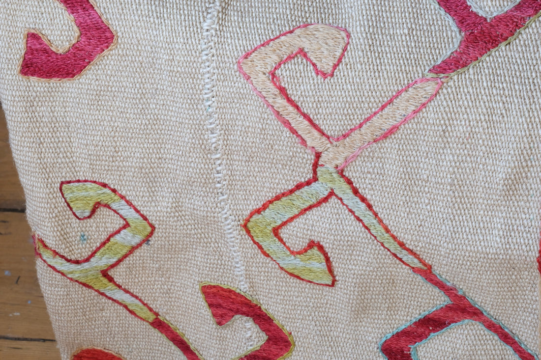 Panel stitching on a Large Uzbek Suzani embroidered textile silk on cotton floral lattice design
