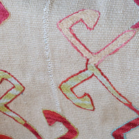 Panel stitching on a Large Uzbek Suzani embroidered textile silk on cotton floral lattice design