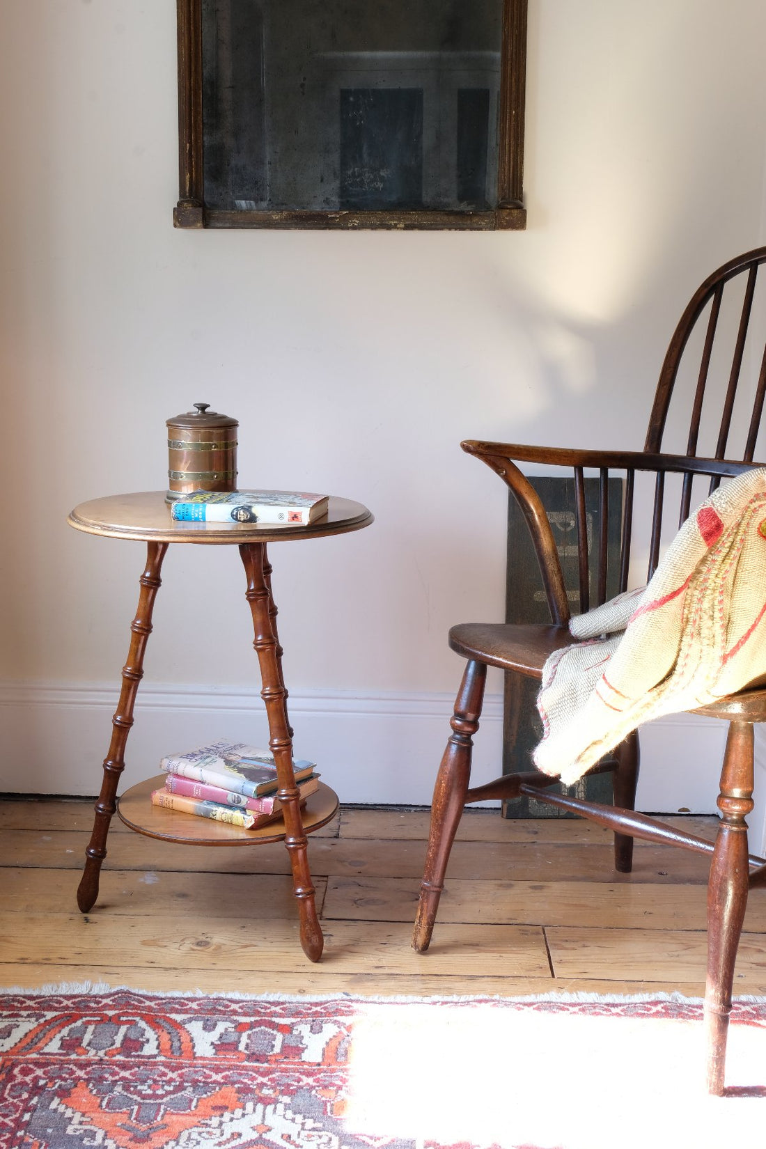 Stylised shot - Victorian mahogany cricket table with faux bamboo legs and two-tone finish