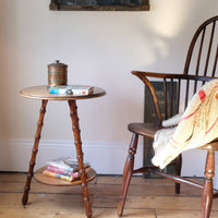 Stylised shot - Victorian mahogany cricket table with faux bamboo legs and two-tone finish