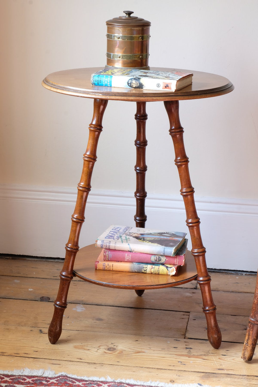 Victorian mahogany cricket table with faux bamboo legs and two-tone finish