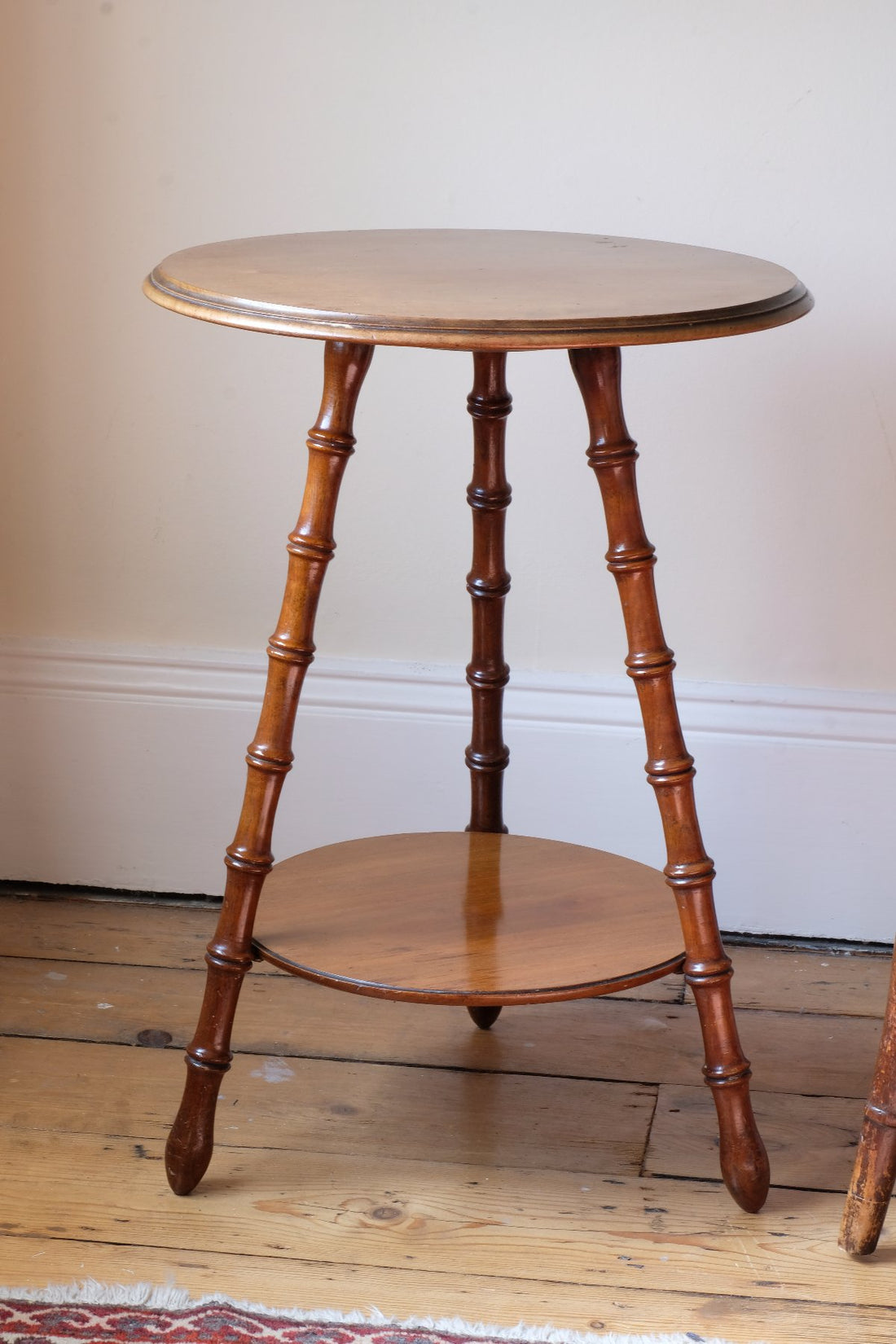 Victorian mahogany cricket table with faux bamboo legs and two-tone finish