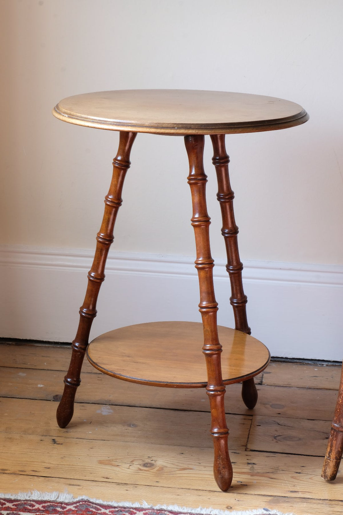 Victorian mahogany cricket table with faux bamboo legs and two-tone finish