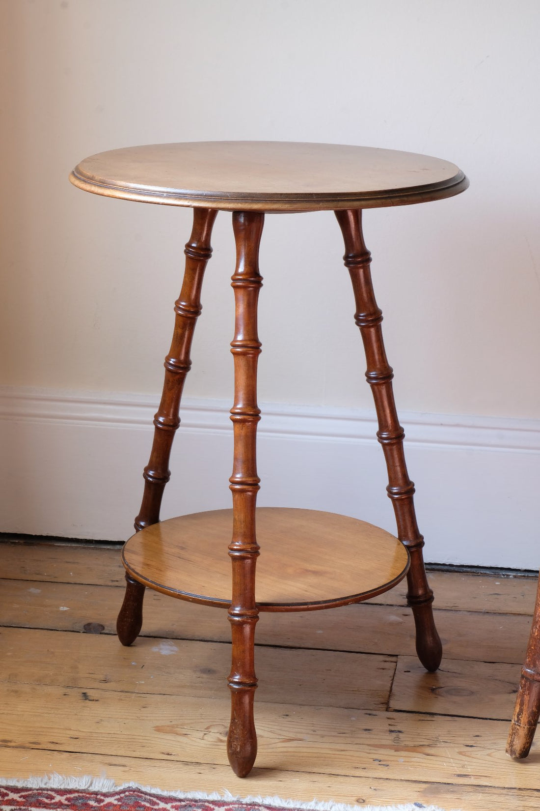 Victorian mahogany cricket table with faux bamboo legs and two-tone finish