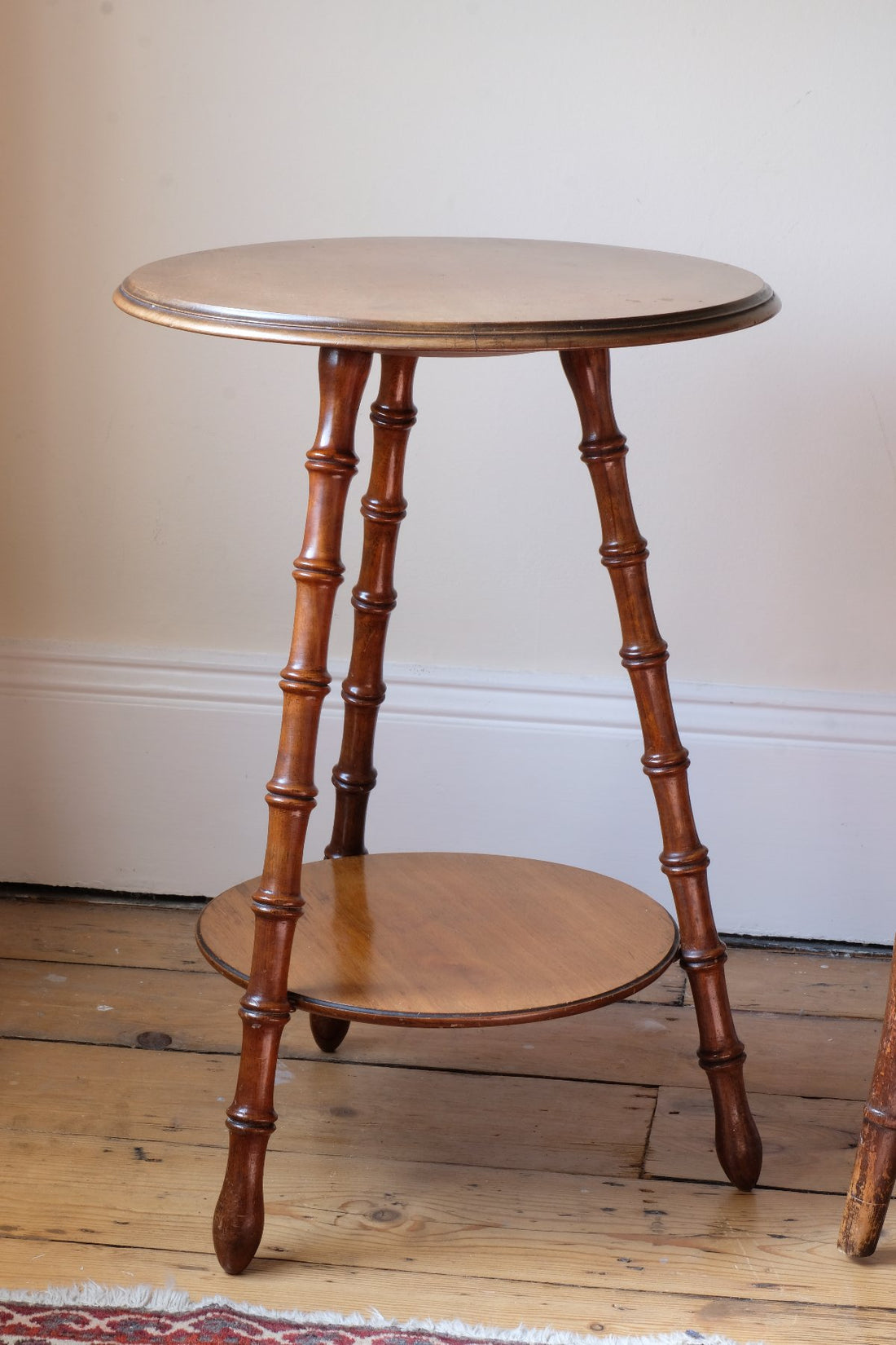 Victorian mahogany cricket table with faux bamboo legs and two-tone finish