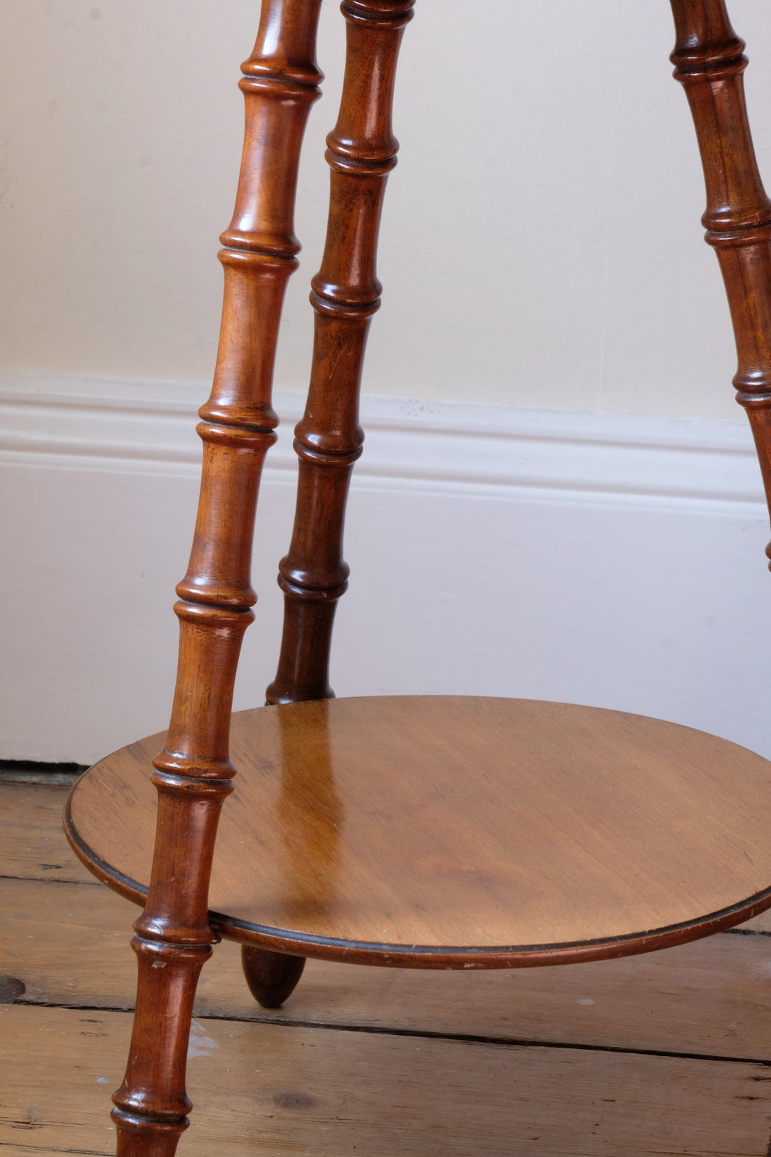 Victorian mahogany cricket table with faux bamboo legs and two-tone finish