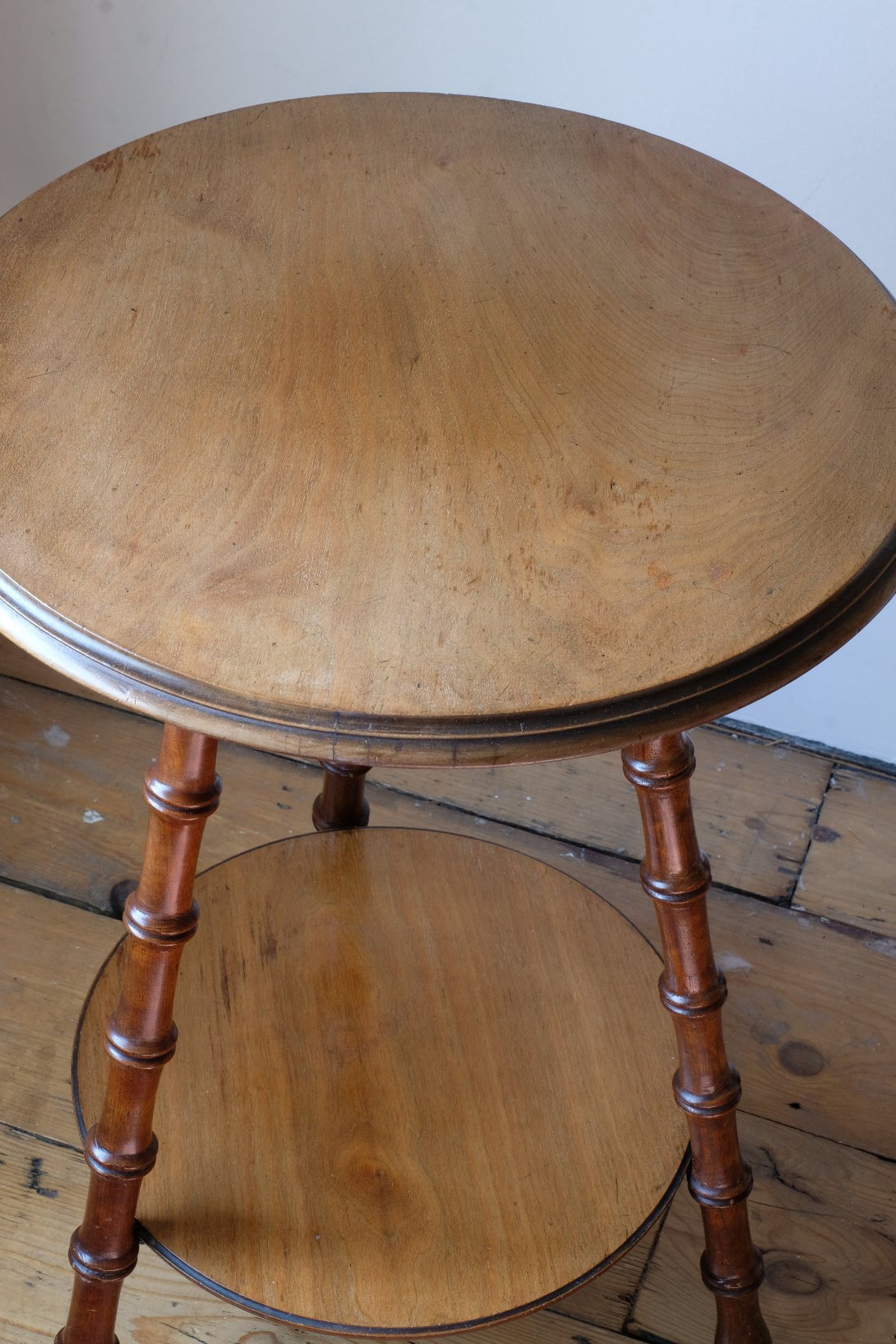 Close up of the timber - Victorian mahogany cricket table with faux bamboo legs and two-tone finish