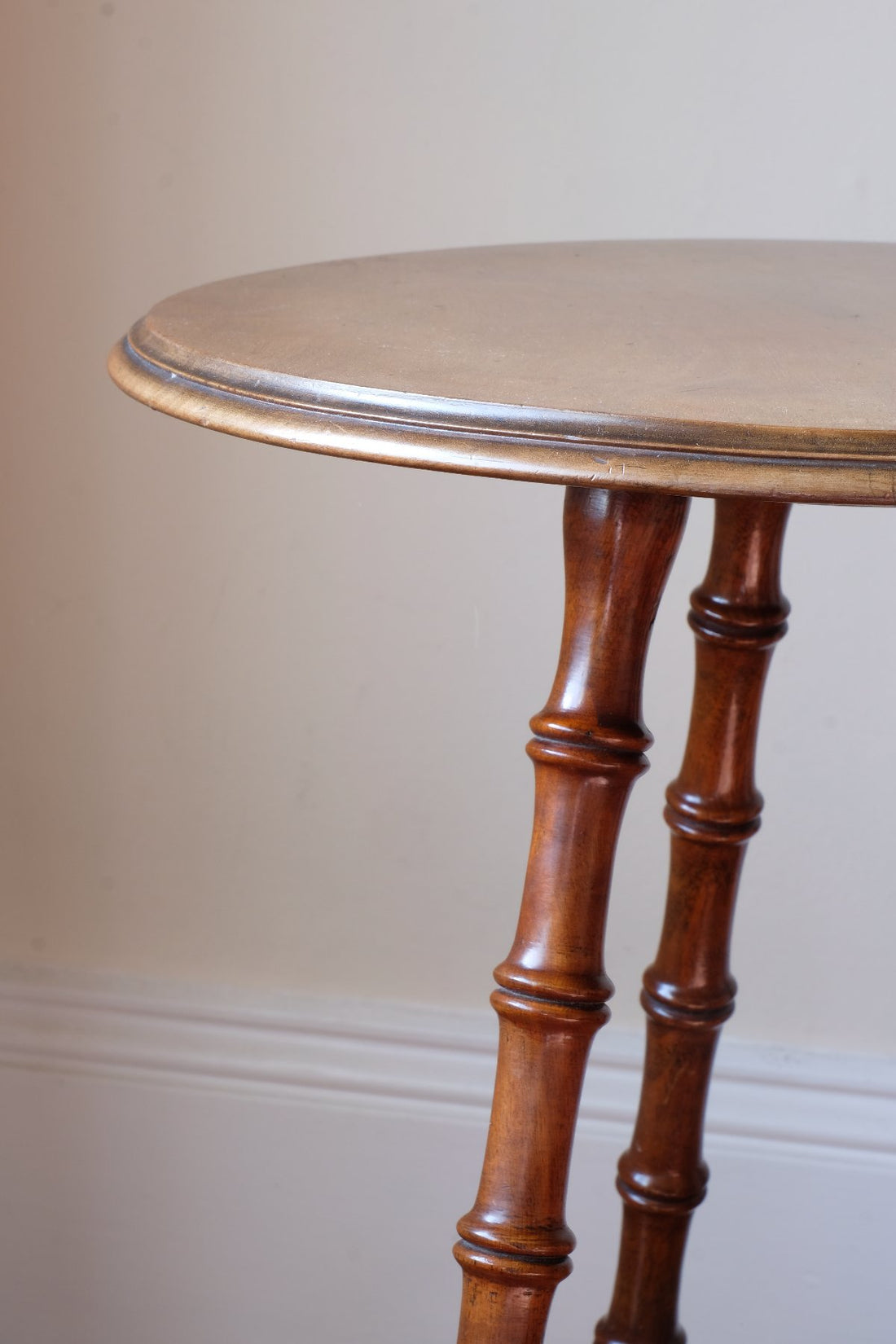 Close up of the faux bamboo detailed legs - Victorian mahogany cricket table with faux bamboo legs and two-tone finish