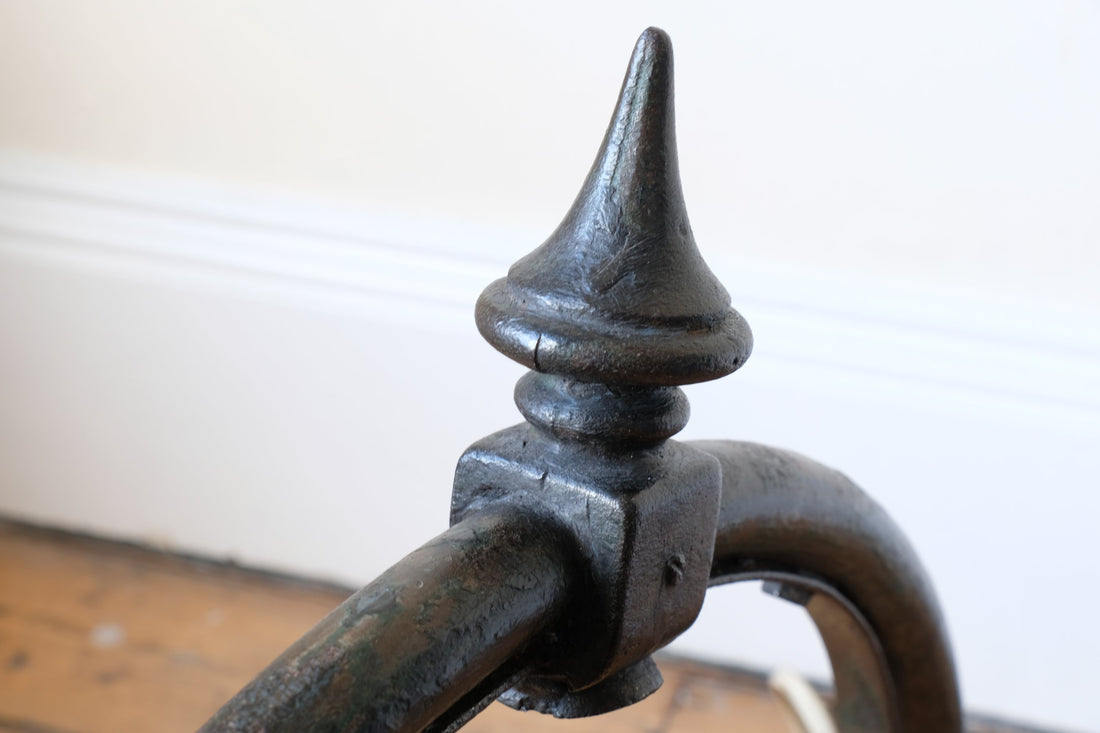 Finial on a 1930s Revo Tipton cast iron and copper swan neck street lamp