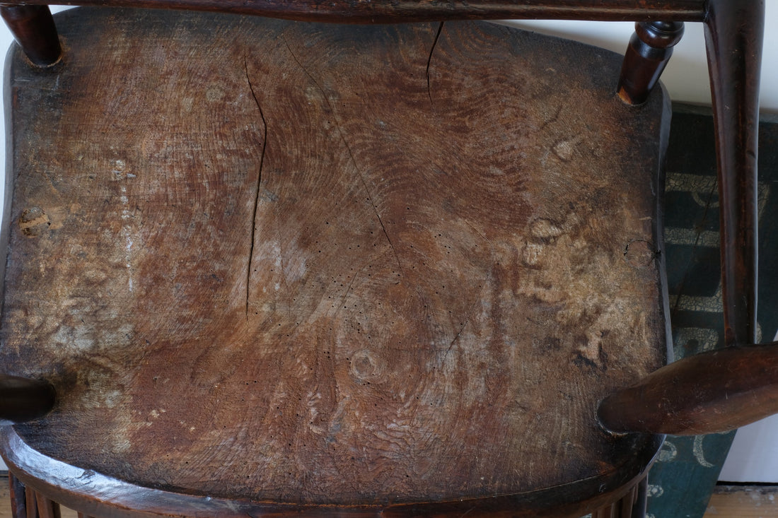 underneath of seat - Antique English Windsor armchair in elm with uneven seat and ash stick back