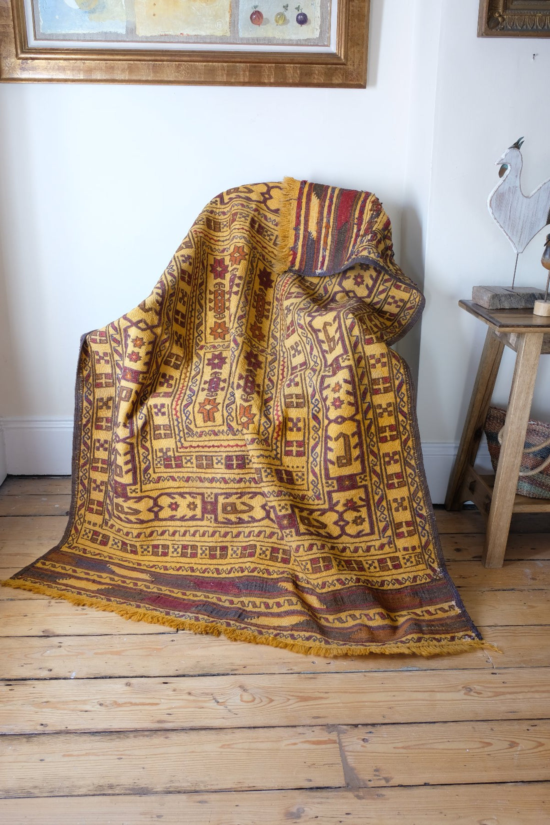 Antique Anatolian kilim rug with saffron ground and geometric motifs