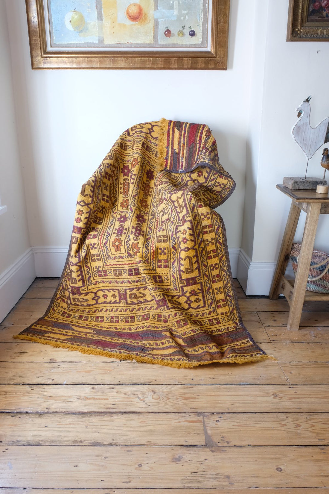 Antique Anatolian kilim rug with saffron ground and geometric motifs
