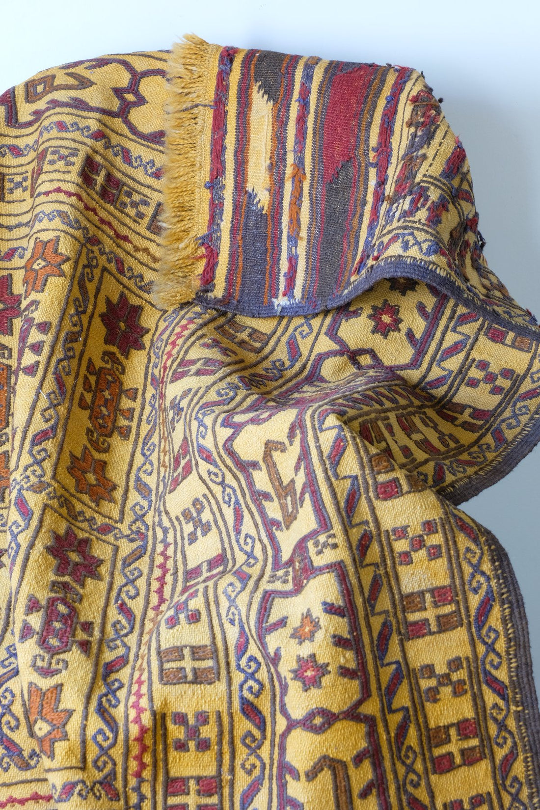 close up and back view - Antique Anatolian kilim rug with saffron ground and geometric motifs