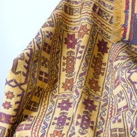 Antique Anatolian kilim rug with saffron ground and geometric motifs