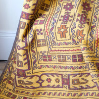 Antique Anatolian kilim rug with saffron ground and geometric motifs