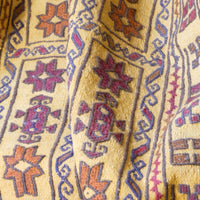 Antique Anatolian kilim rug with saffron ground and geometric motifs