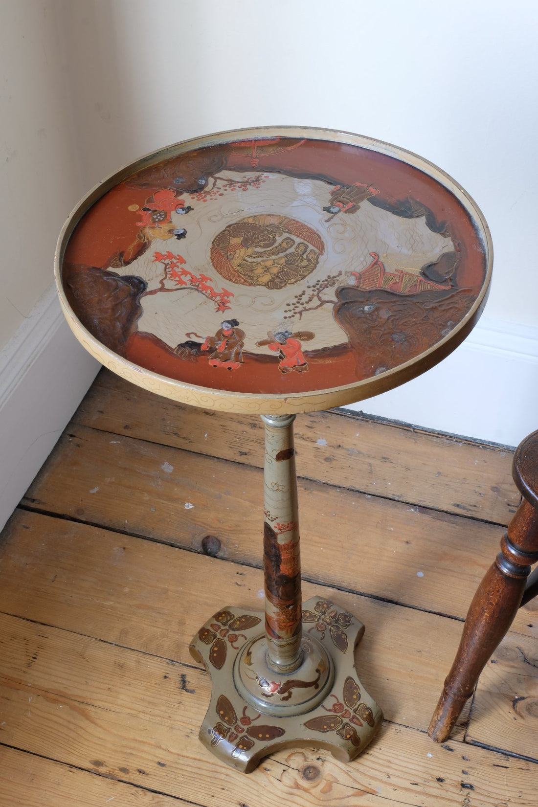 Pair of antique chinoiserie lacquered pedestal side tables with hand painted oriental scenes and gilt detailing