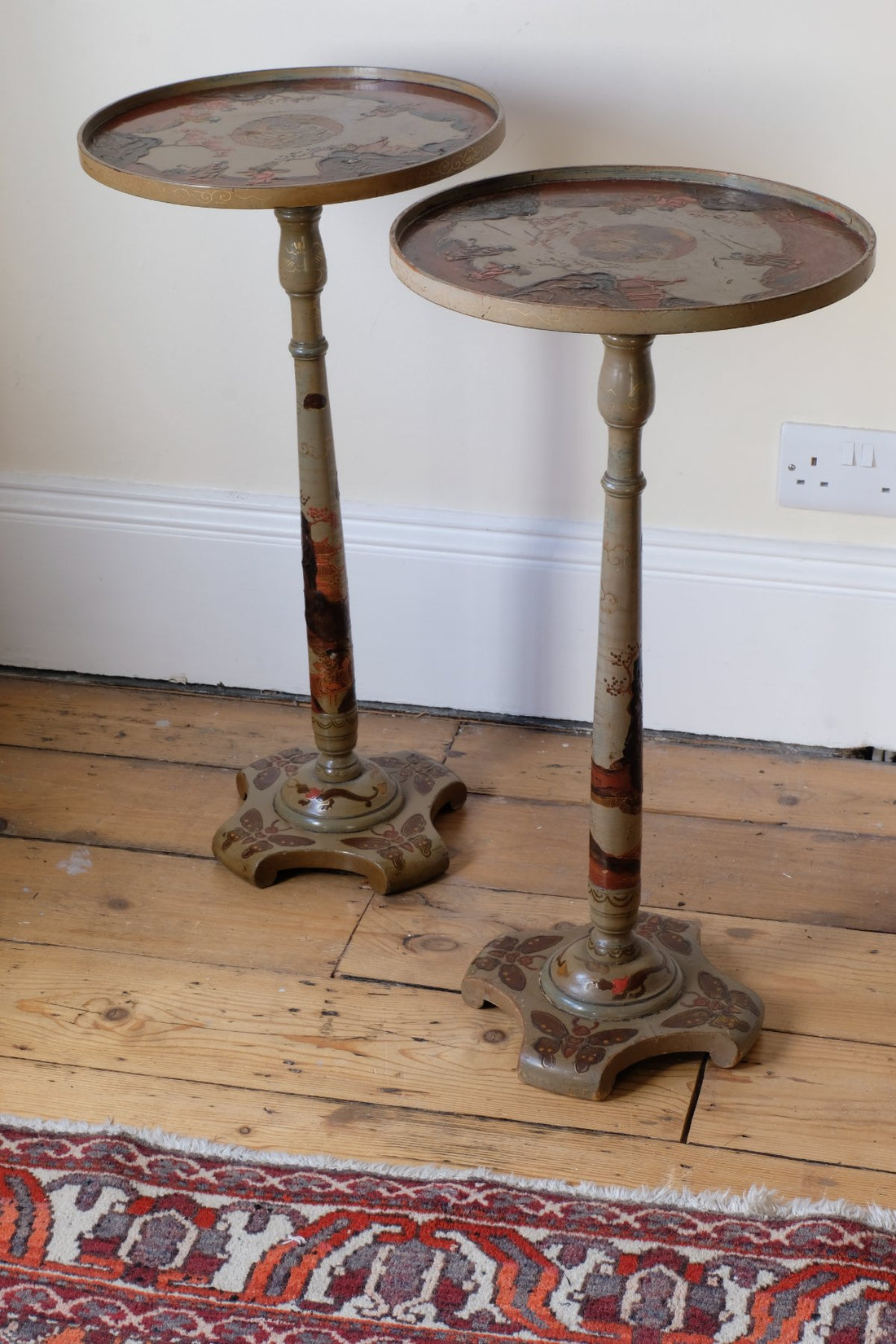 Pair of antique chinoiserie lacquered pedestal side tables with hand painted oriental scenes and gilt detailing