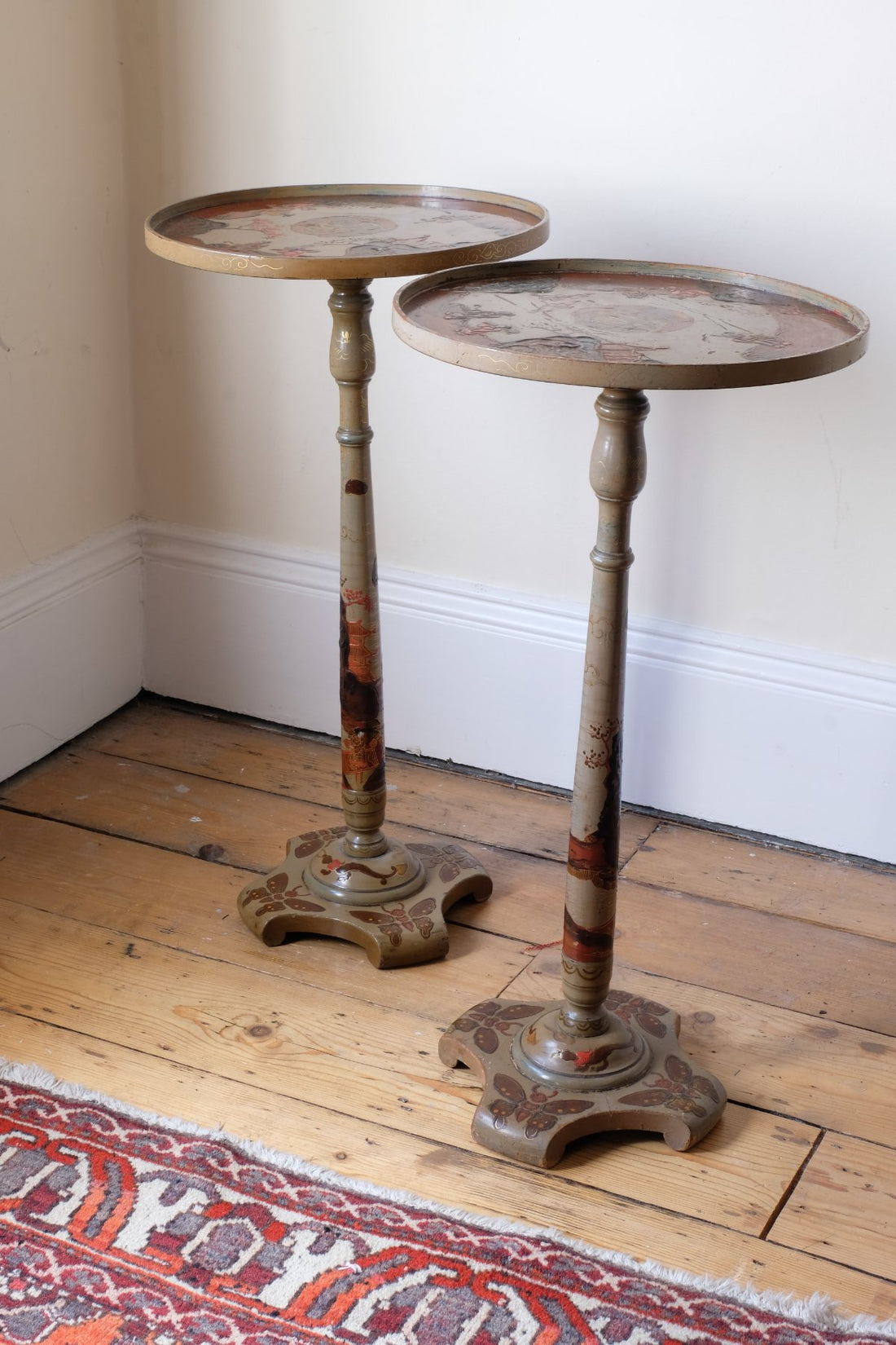 Pair of antique chinoiserie lacquered pedestal side tables with hand painted oriental scenes and gilt detailing