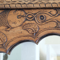 Close up of the carved fish - large antique Indian carved hardwood mirror with Indo-Islamic Moorish arch detail