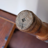 Bottom of he foot showing the wear on an Antique Victorian ash side table Harrison and Son Blackburn with drawer and pot board