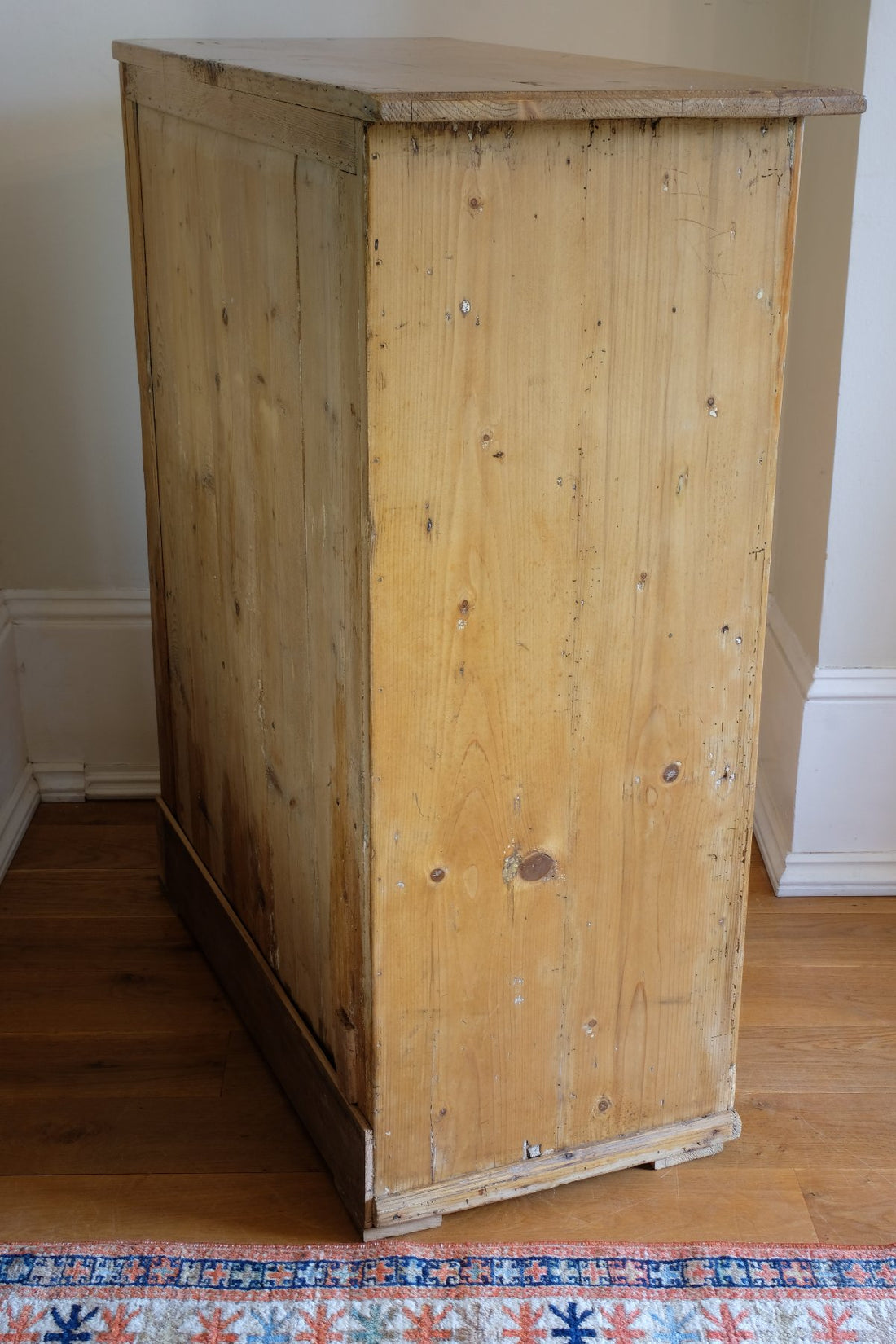 side view - Victorian pine chest of drawers with cupboard base English antique