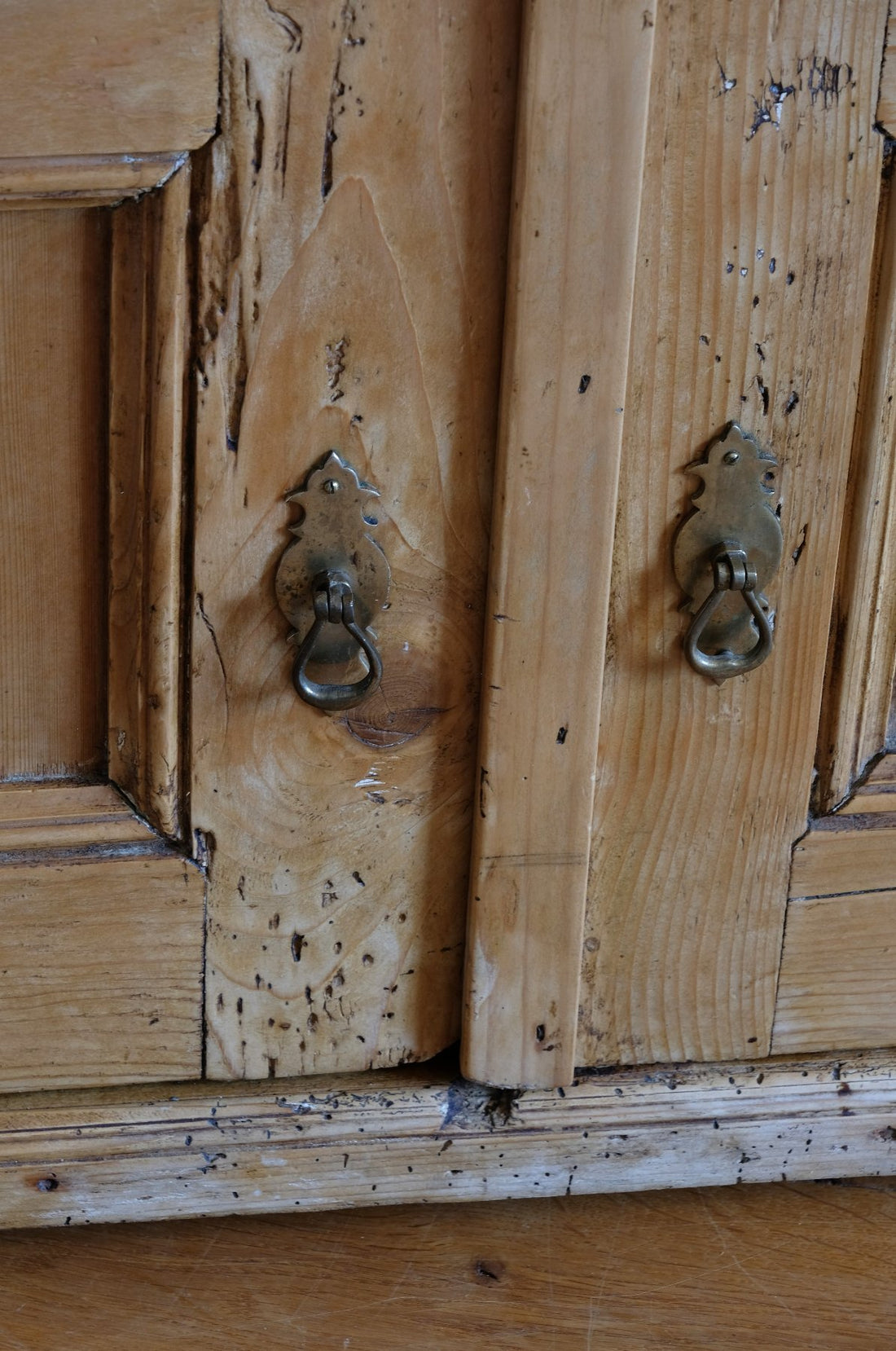 Close up of the old gnarly pine door - Victorian pine chest of drawers with cupboard base English antique