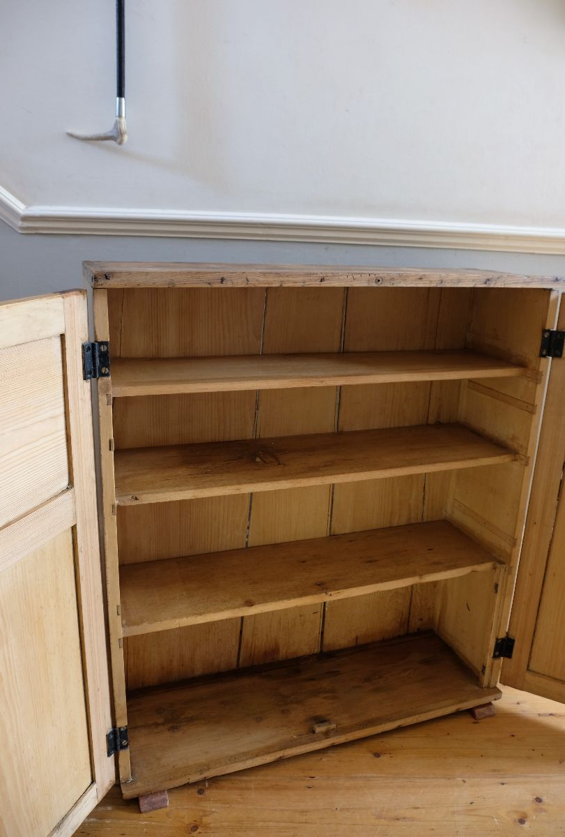 Inside the Early 19th Century English Pine Cupboard with Four Panel Doors