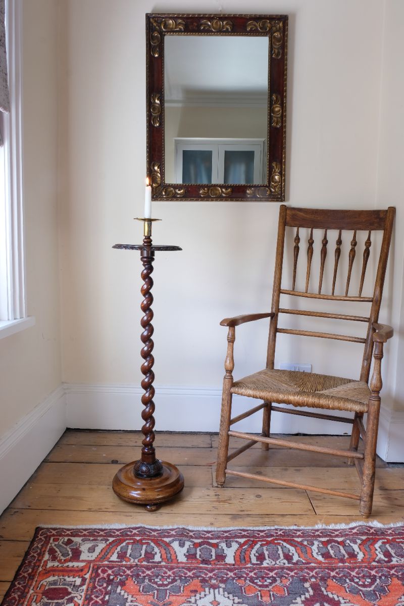 Rare Victorian walnut barley twist candle and wine stand with brass sconce and carved foliate decoration, circa 1870