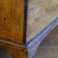 close up of the chip carved corner on an Early 19th Century English Elm Six Plank Coffer Chest With Internal Till
