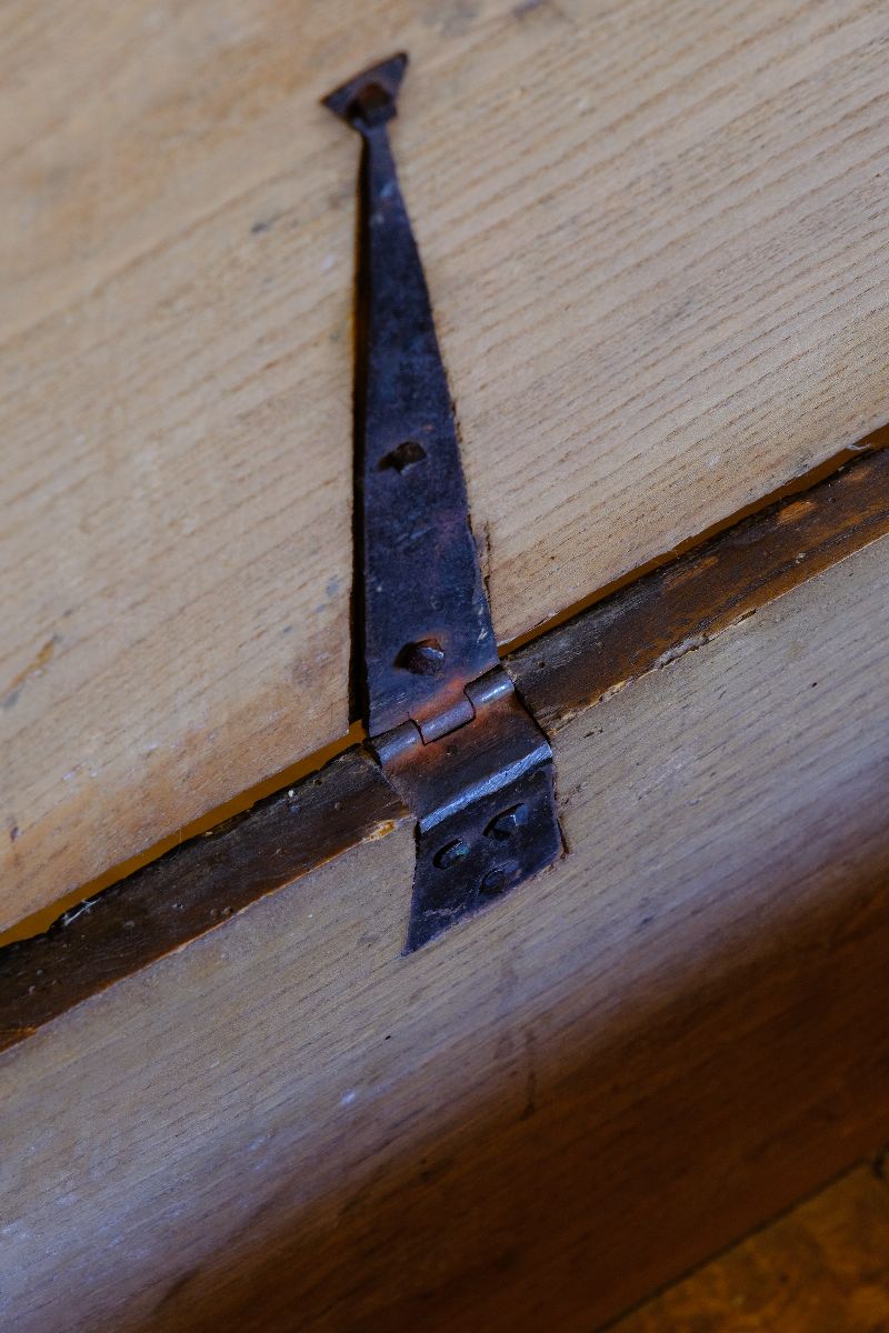 hand forged hinge on an Early 19th Century English Elm Six Plank Coffer Chest With Internal Till