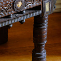 Turned legs on an Antique Kutch Damchiya dowry chest with mirror inlay and carved hardwood fretwork, Gujarat c.1900–1930