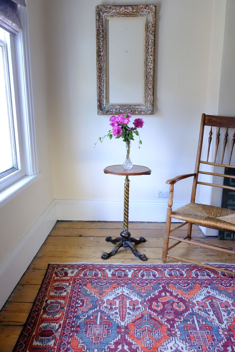 Antique Victorian brass telescopic wine table with mahogany top and lion’s paw feet