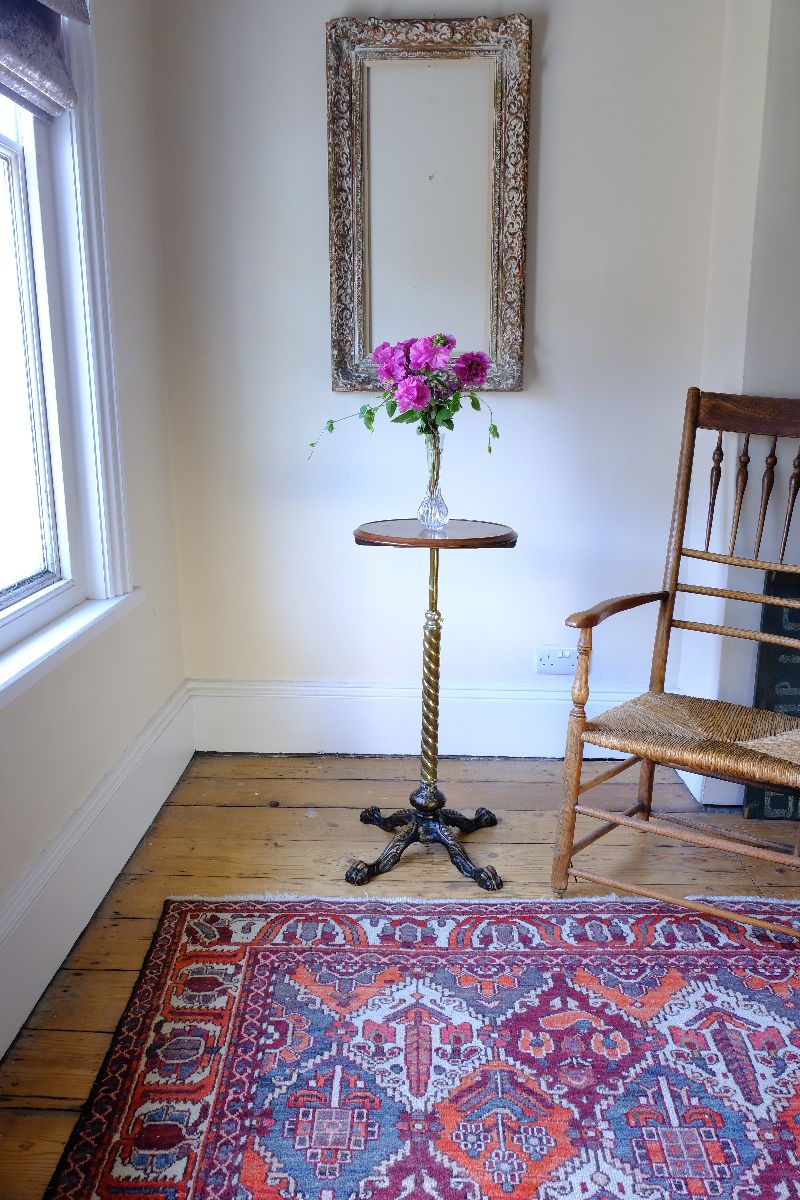 Antique Victorian brass telescopic wine table with mahogany top and lion’s paw feet