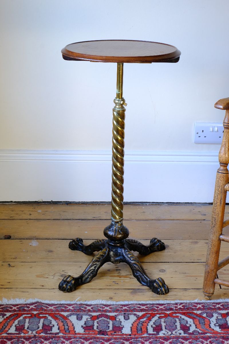 Antique Victorian brass telescopic wine table with mahogany top and lion’s paw feet